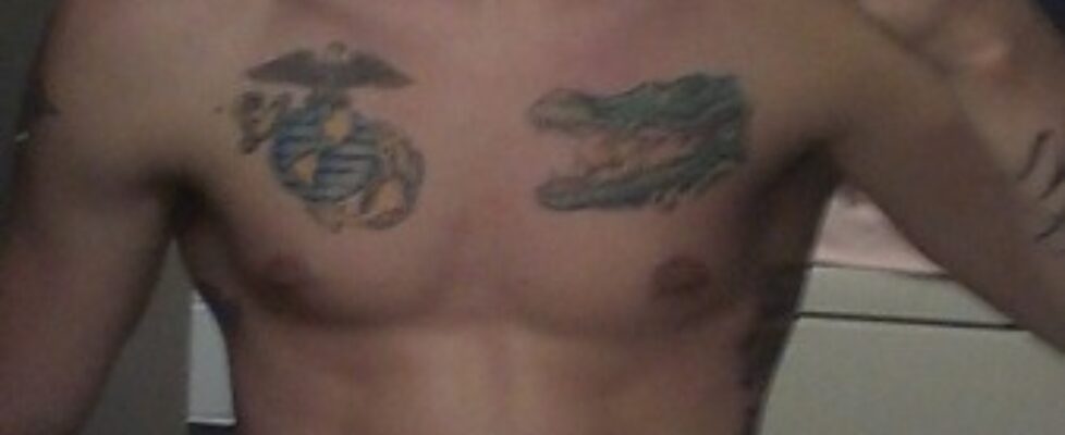 is the tattoo on the right an alligator