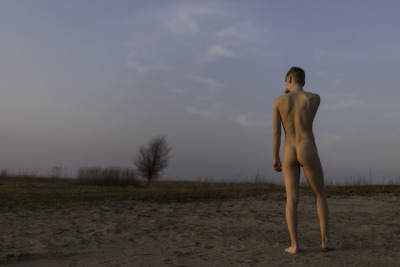 golden hour at the water throwing stones like the