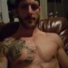 hung tatted guy fucks sofa cums