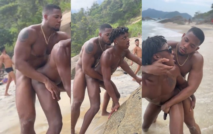 Black guys fuck on a public beach