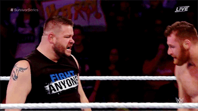 hugs and hand lifting at survivor series