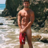 jake miller takes off swim trunks at beach